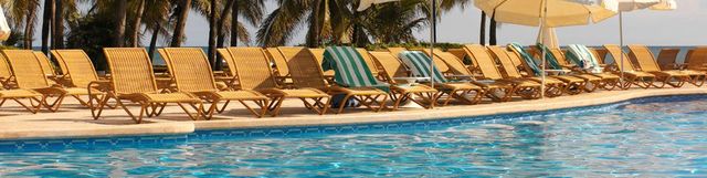 Swimming pool, Resort, Vacation, Leisure, Sunlounger, Tree, Real estate, Hotel, Palm tree, Eco hotel, 