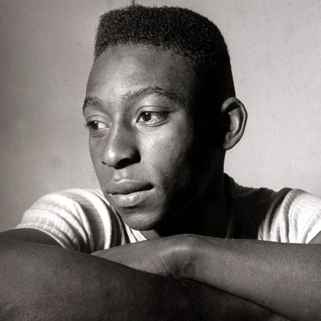 pele in a white shirt