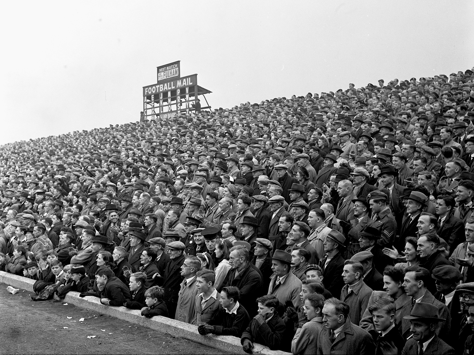 football, 31st october 1948, fratton park, portsmouth, england, crowds pack onto the terraces to watch portsmouth fc  photo by popperfoto via getty imagesgetty images