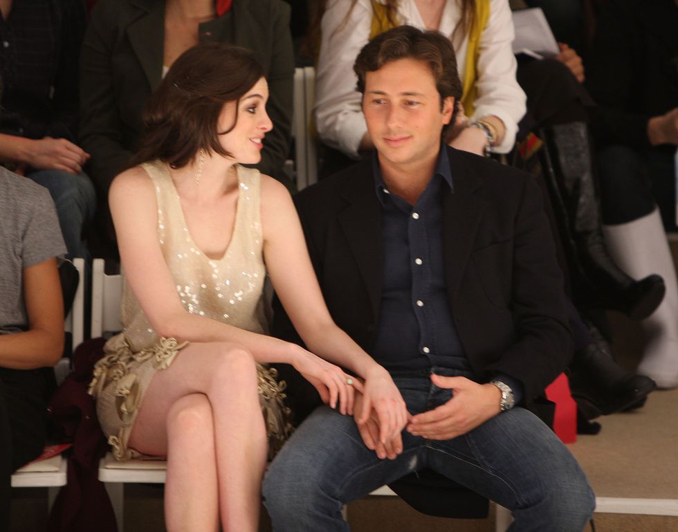 new york   february 01  actress anne hathaway and raffaello follieri attends the erin fetherston fall 2008 fashion show during mercedes benz fashion week fall 2008 at the promenade at bryant park on february 1, 2008 in new york city  photo by stephen lovekingetty images for img