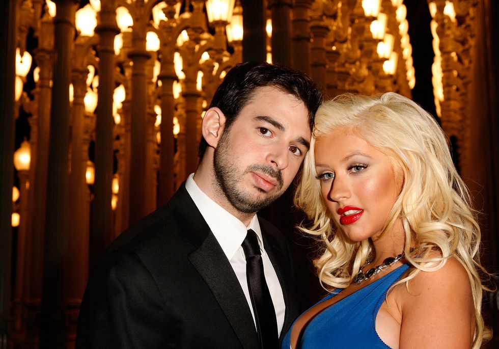 los angeles, ca   february 09  recording artist christina aguilera poses with husband jordan bratman at lacmas opening celebration of the broad contemporary art museum on february 9, 2008 in los angeles, california  photo by jeff vespawireimage
