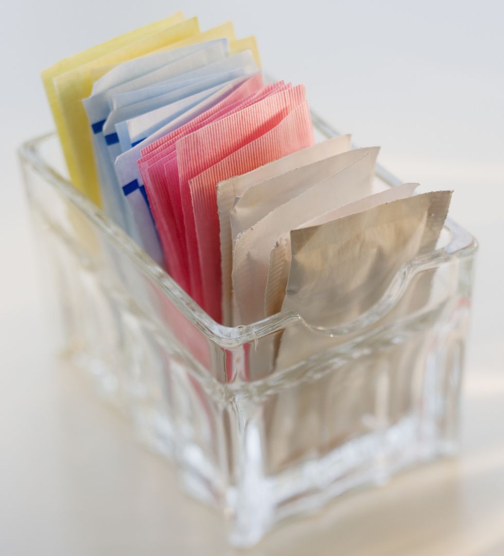 close up of sugar and sweetener packets