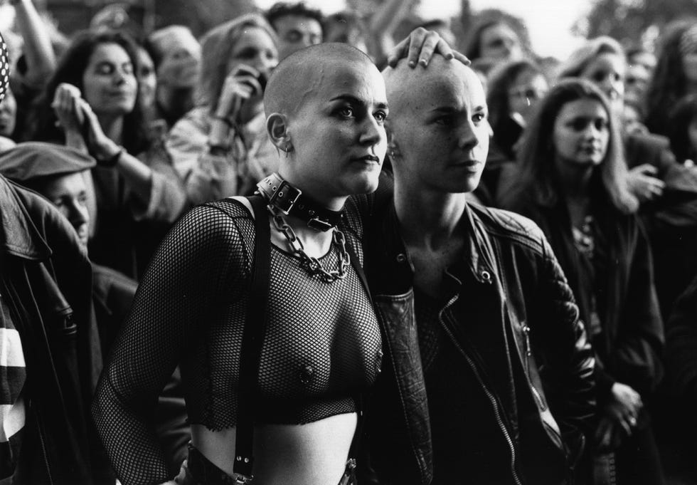 A lesbian couple attends the annual gay pride march promoting gay and lesbian rights, London, 19 June 1993.  Photo: Steve Isonhalton archivegetty images