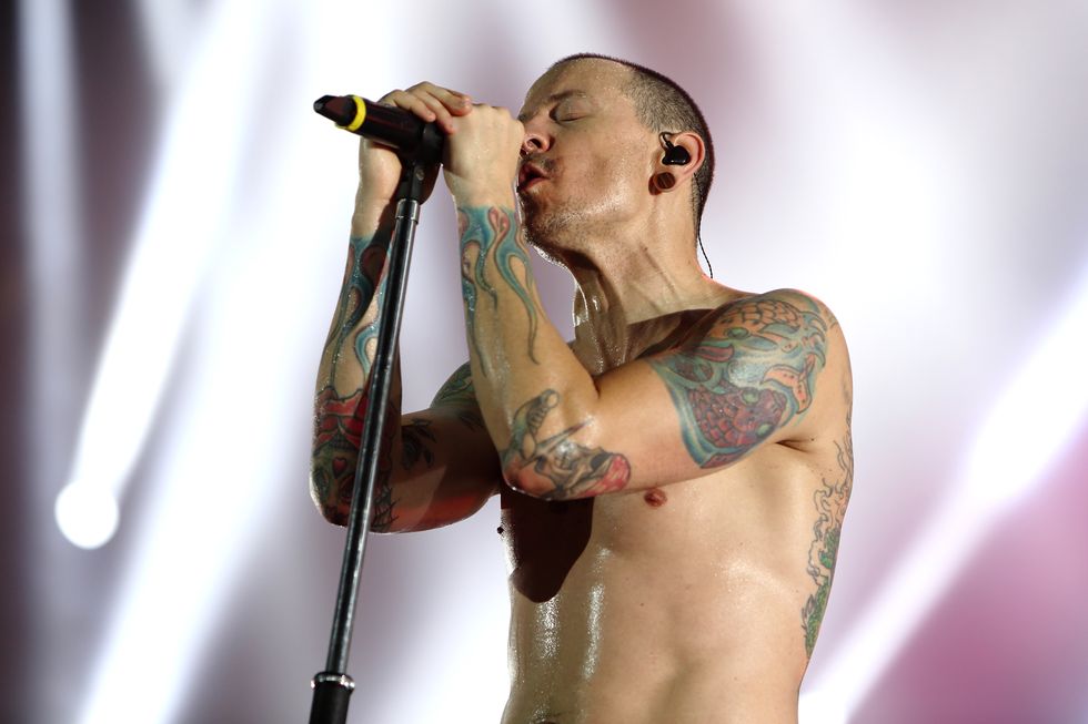 Performance, Microphone, Singing, Barechested, Singer, Music artist, Performing arts, Arm, Musician, Tattoo, 