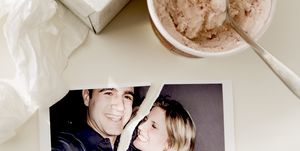 ripped photograph next to ice cream and tissues