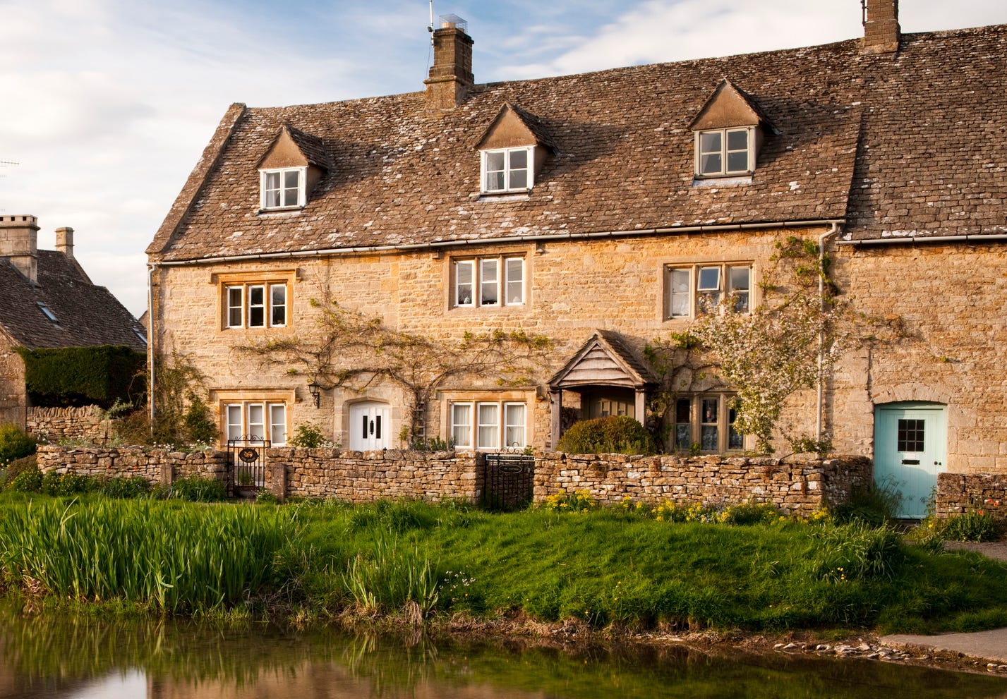 the scenic village of lower slaughter in the cotswolds, gloucestershire