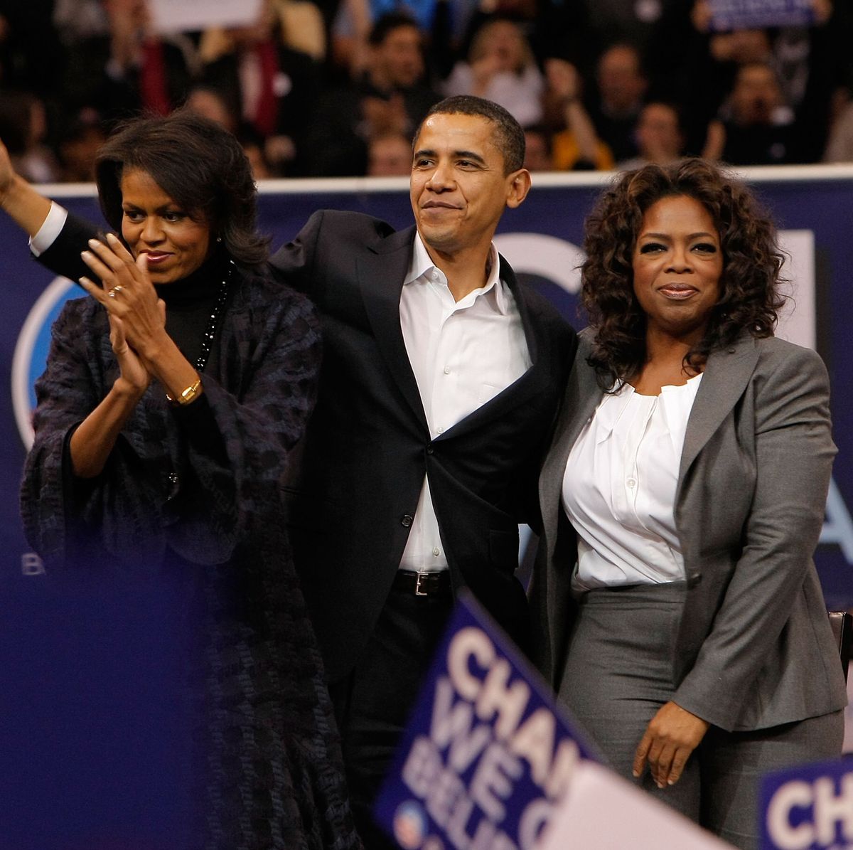 manchester, nh   december 09  presidential candidate barack obama center is joined by special guest oprah winfrey right and his wife michelle obama during a rally held at the verizon wireless arena in manchester, new hampshire on december 9, 2007 in new york city  photo by jemal countesswireimage