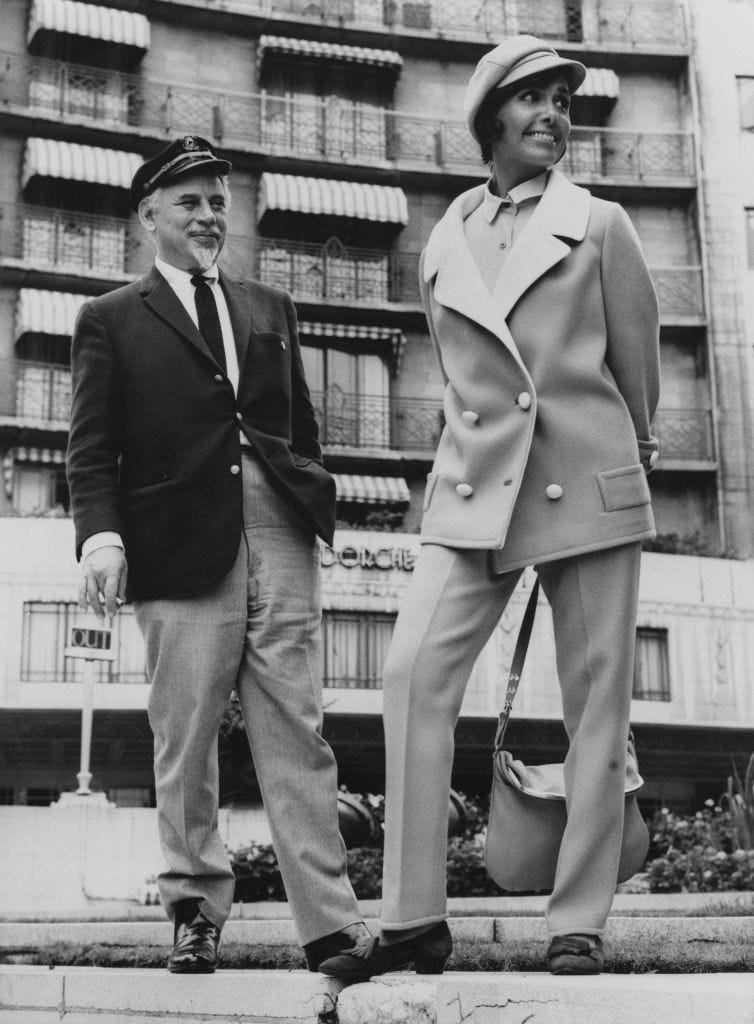 Photograph, Standing, Snapshot, Black-and-white, Suit, Monochrome, Photography, Leg, Outerwear, Street fashion, 