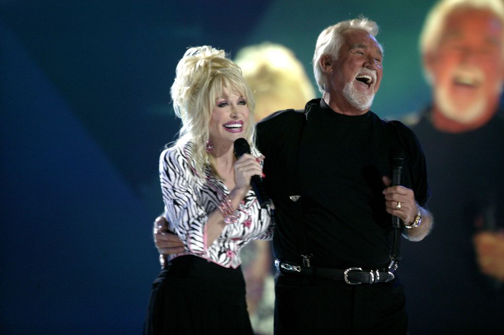 Dolly Parton and Kenny Rogers perform their hit duet "Islands In The Stream" at the CMT's "100 Greatest Duets" concert in June 2005