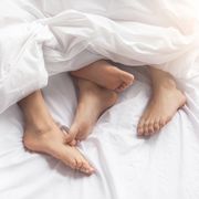 White, Leg, Skin, Arm, Hand, Barefoot, Bed sheet, Textile, Photography, Linens, 