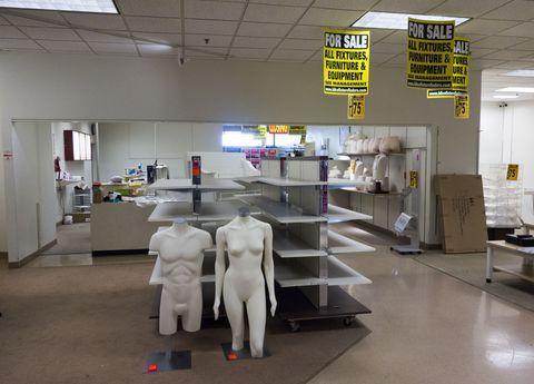 empty shopping racks and mannequins being sold at discount prices are displayed at the jcpenney at the columbia mall on july 24, 2017 in bloomsburg, pennsylvania the jcpenney is having a store liquidation sale and plans to close july 31, 2017 abandoned by the big brands, deserted by the young, the american mall, once temples of the shopping, have become ghost towns, victims of the explosion of online shopping   afp photo  don emmert  to go with afp story by john biers, "deserted, us shopping centers look for a future"        photo credit should read don emmertafp via getty images