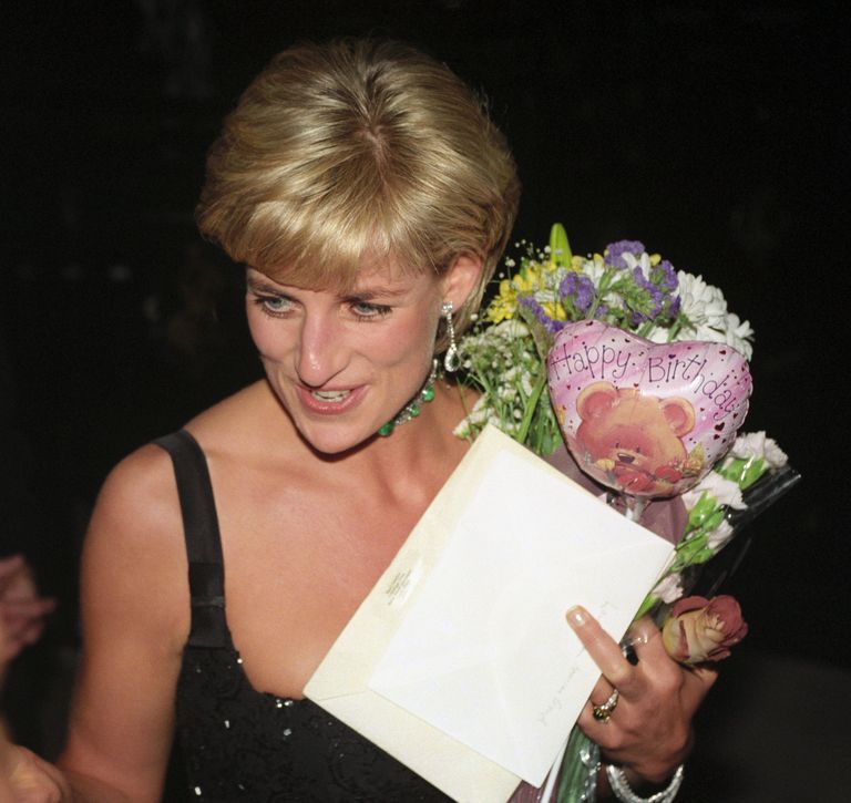 diana, princess of wales, leaves the tate gallery's centenary gala dinner carrying birthday gifts she received from friends for her 36th birthday   photo by david cheskin   pa imagespa images via getty images