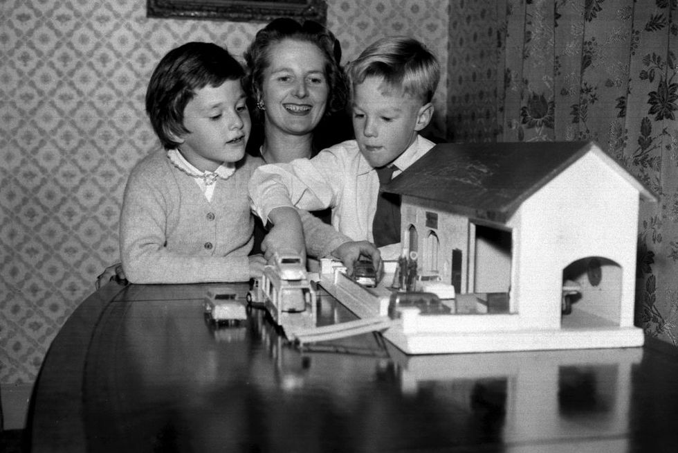 margaret thatcher, 33, conservative mp for fincley and friern barnet, with her twin children, mark and carol, aged 6, at their home in farnborough, kent mrs thatc her is an ma and bsc from oxford university and a barrister   photo by pa images via getty images