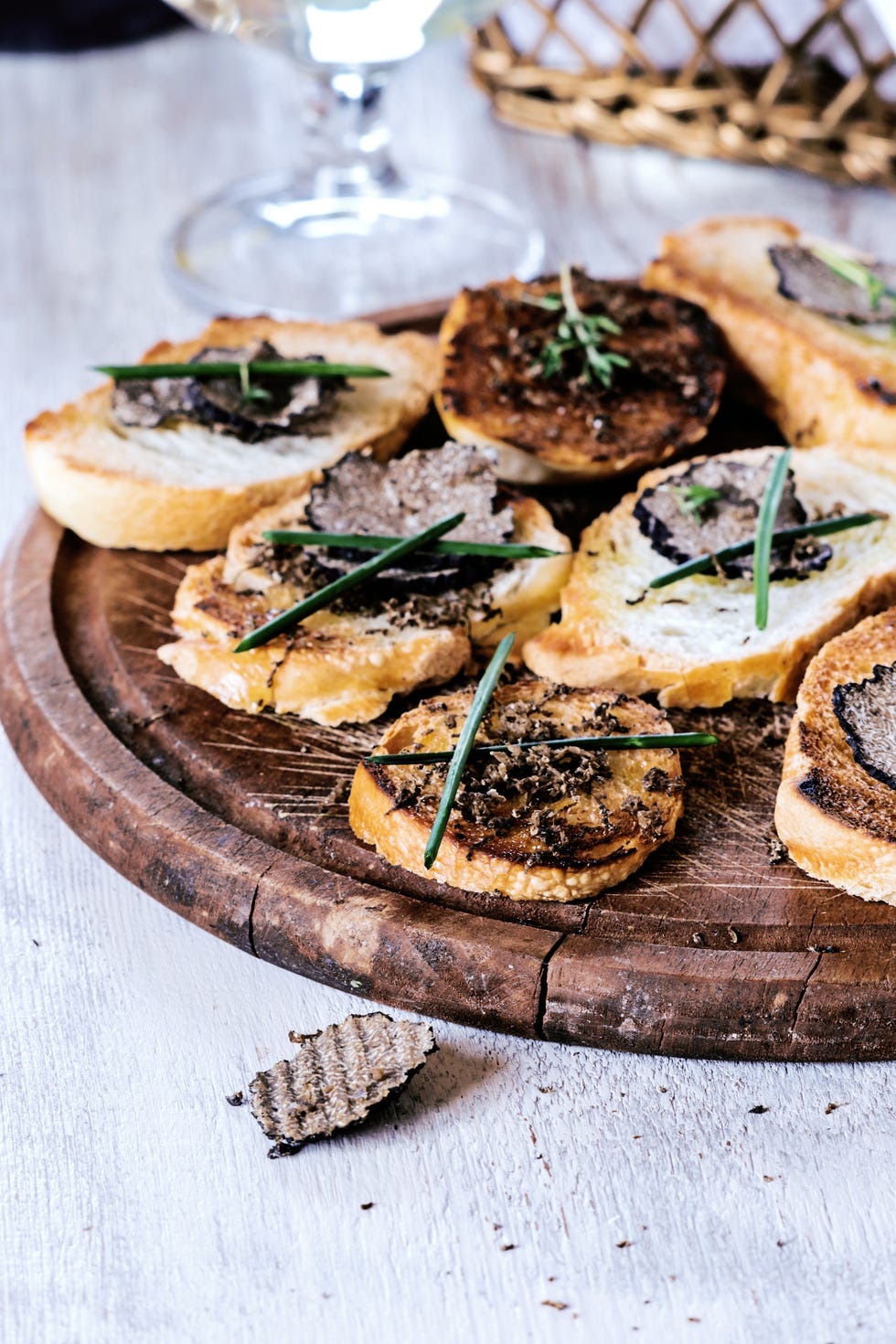 Italian black truffle bruschetta with herbs and oil on grilled or toasted crusty ciabatta bread