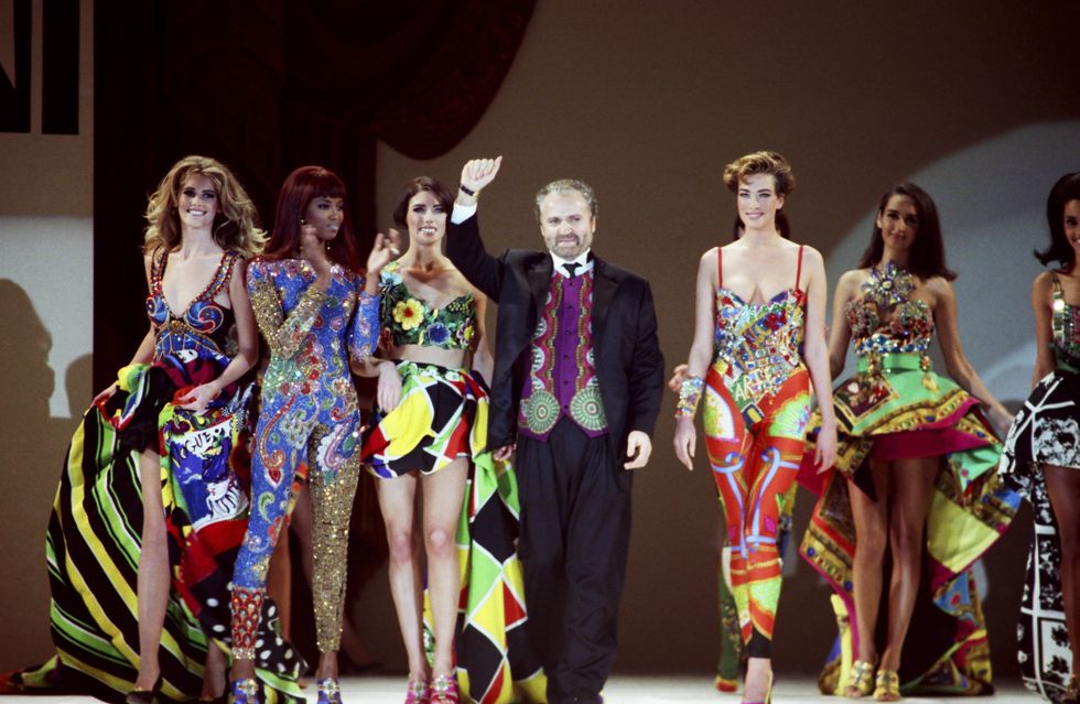 Stars Attend Gianni Versace Fashion Show