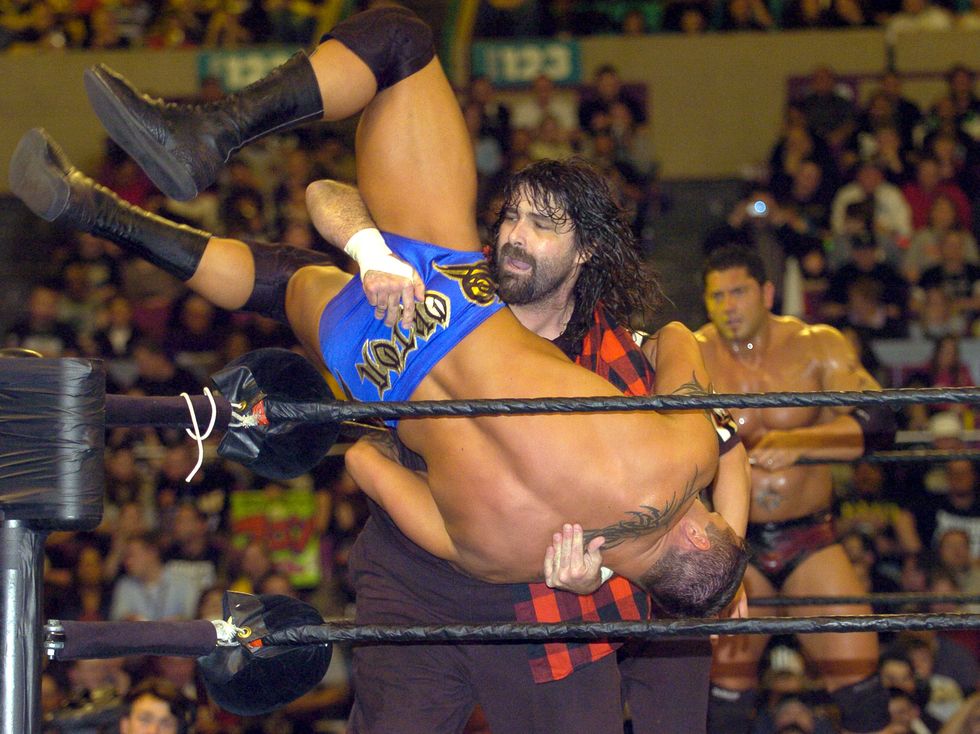 Mick Foley wrestling as himself in 2004