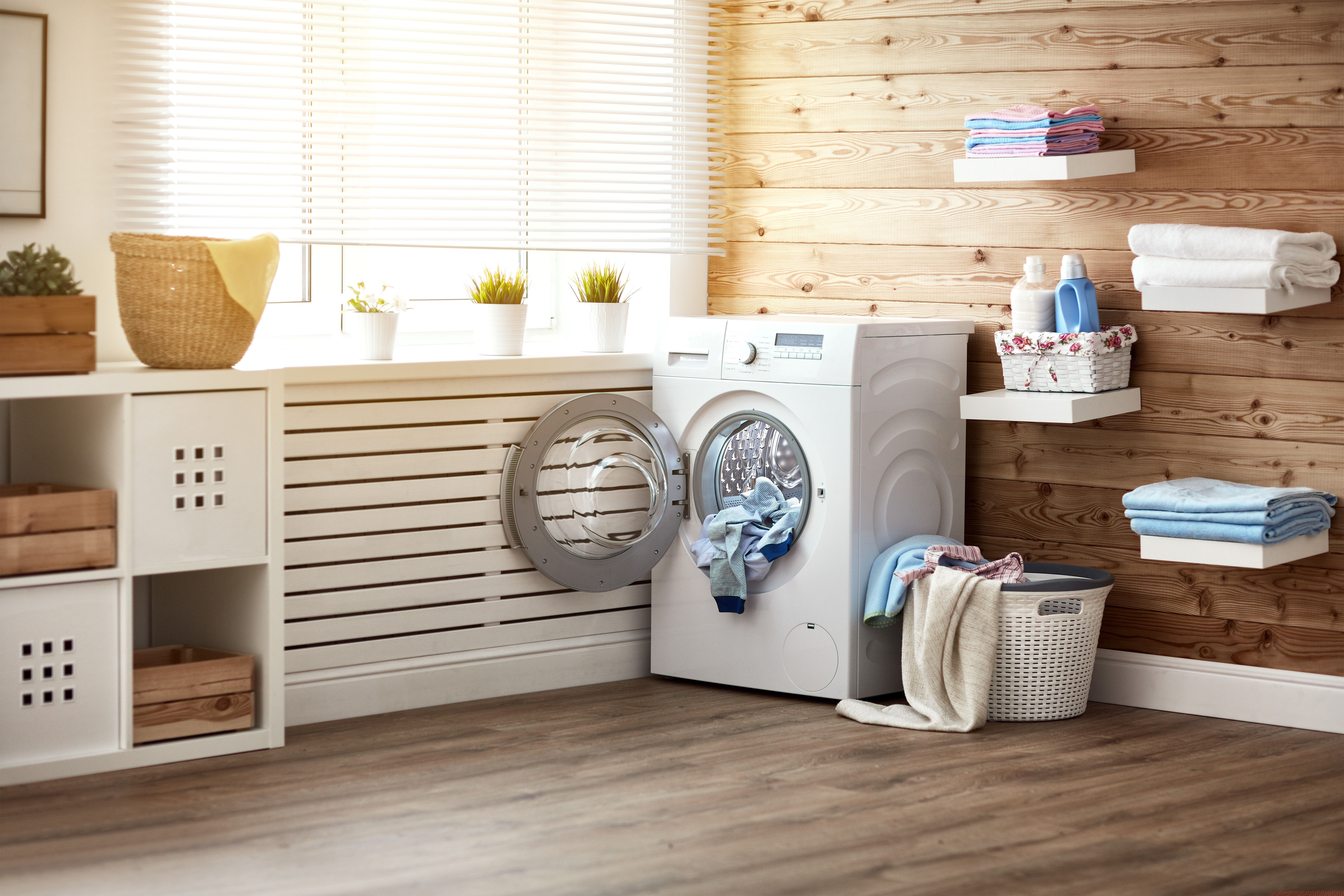 Tumble dryer over store washing machine