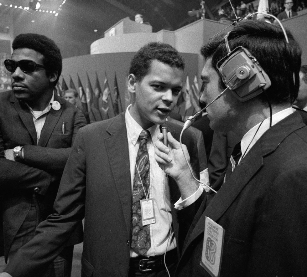 american politician julian bond center, congressman from georgia and future head of the naacp, answers questions from journalist dan rather right on the floor at the democratic national convention in the international amphitheatre, chicago, illinois, august 29, 1968 the convention was held between august 26 and 29 and saw the official announcement of humphrey as the democratic presidential nominee and edmund muske as the vice presidential nominee photo by cbs photo archivegetty images