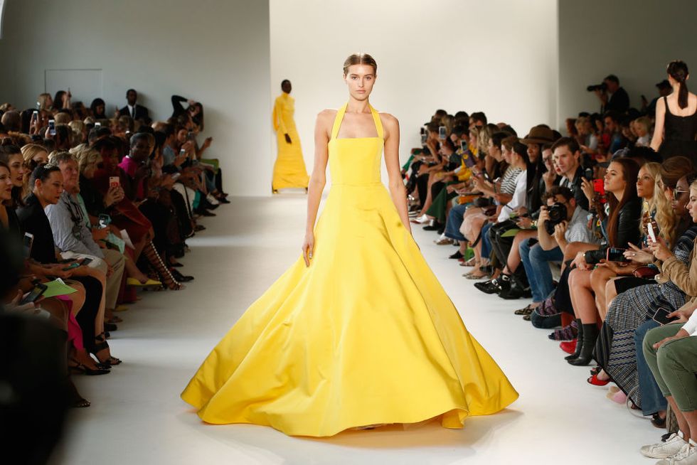 Fashion model, Fashion, Dress, Gown, Clothing, Fashion show, Haute couture, Yellow, Runway, Event, 
