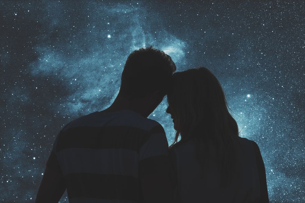 silhouettes of a young couple under the starry sky my astronomy work