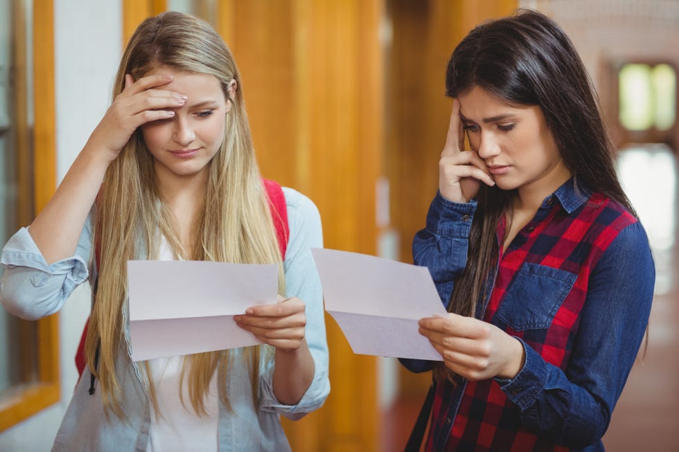 Anxious students looking at results