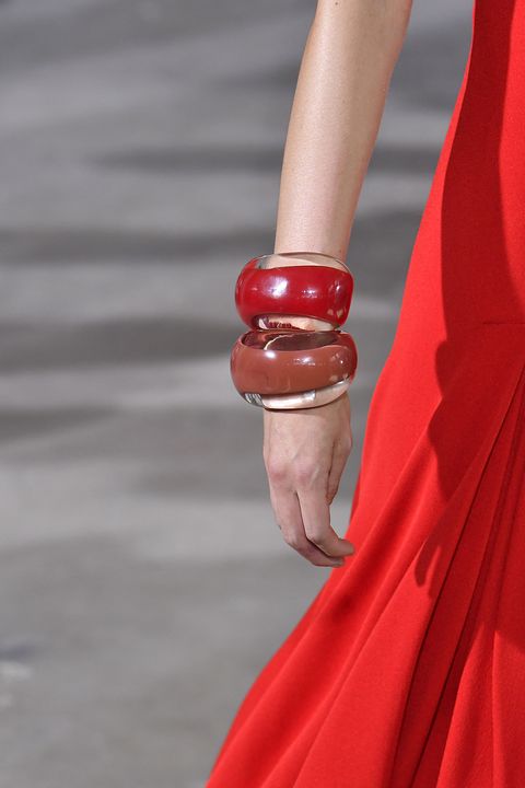 Red, Fashion, Orange, Haute couture, Arm, Leg, Close-up, Hand, Dress, Human leg, 