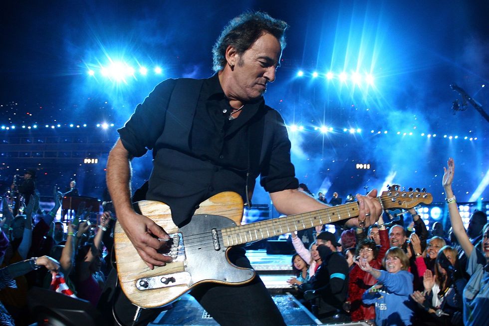 tampa, fl   february 01  musician bruce springsteen and the e street band  perform at the bridgestone halftime show during super bowl xliii between the arizona cardinals and the pittsburgh steelers on february 1, 2009 at raymond james stadium in tampa, florida  photo by jamie squiregetty images