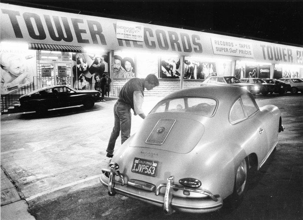 los angeles, ca may 16 a man gets into his porsche outside of tower record on sunset boulevard in los angeles on may 16, 1984 photo by janet knottthe boston globe via getty images