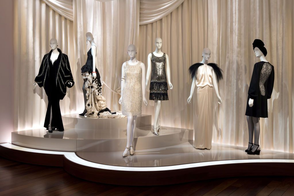 Display window, Fashion, Mannequin, Dress, Fashion design, Boutique, Display case, Outerwear, Costume design, Collection, 