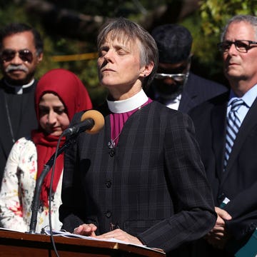 Vigil At Washington National Cathedral Calls For Action Against Gun Violence washington, dc october 03 rev mariann budde, bishop of the episcopal diocese of washington leads a group of local religious leaders from many faiths in prayer during a vigil to protest gun laws in the wake of the mass shooting in las vegas, in the bishops garden at the national cathedral on october 3, 2017 in washington, dc photo by mark wilsongetty images