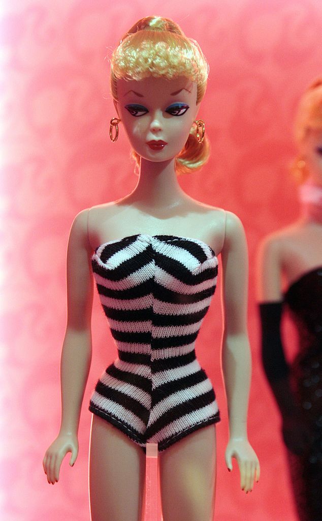 the first barbie doll, created in 1959 is displayed on april 6, 2009 in paris during the barbie fashion show 2009, an exhibition dedicated to the worlds most famous toy, that takes places at the galerie lafayette store from april 6 to 25, 2009 to celebrate her 50th birthday the whole 1st floor shows the 29 centimeter 114 inch beauty dressed up in outifits specially created by fashion designers such as christian lacroix, gerard darel, sonia rykiel, karl lagerfeld and jean charles de castelbajac afp photo francois guillot photo credit should read francois guillotafp via getty images