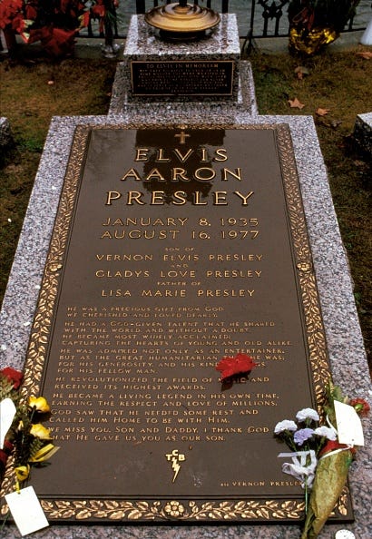 elvis life in photos mandatory credit ebet robertsgetty images united states circa 2000 photo of elvis presley and graceland elvis presleys gravestone at graceland photo by ebet robertsredferns