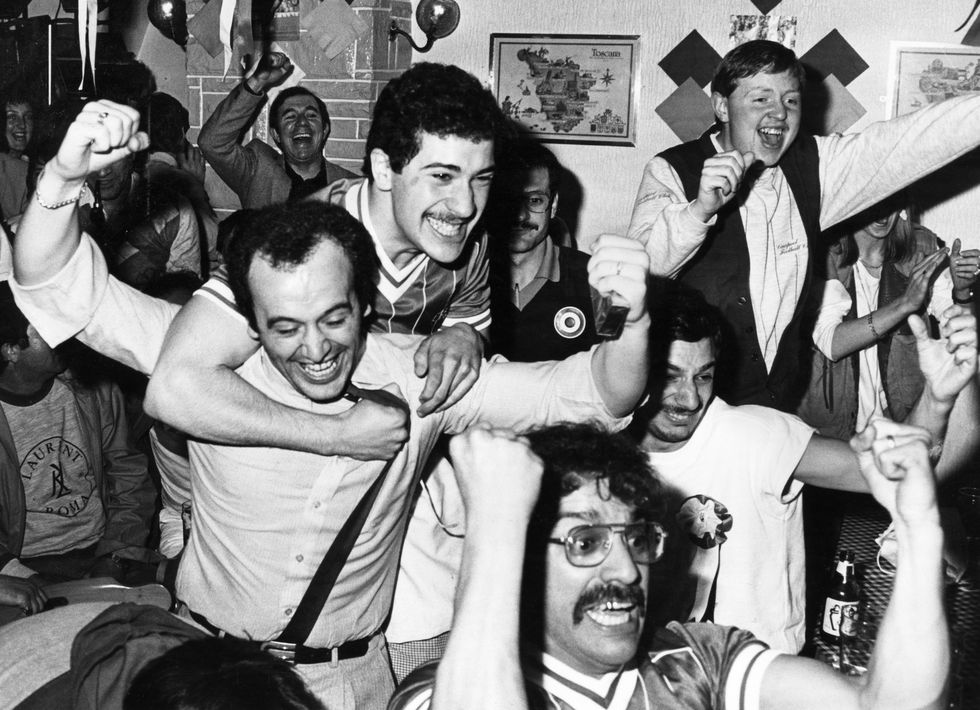 joy for liverpool fans gathered at the local italian buco di bacco restaurant as their team defeat as roma in the european cup final to claim their fourth european cup, the match, which ended in a 1 1 draw, was decided on penalties in liverpool's favour, may 1984 photo by john davidsonliverpool echomirrorpixgetty images