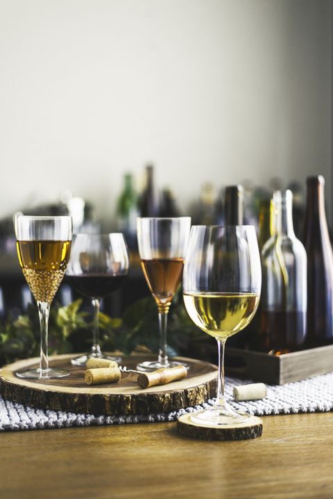 Wine tasting theme with various bottles of wine and glasses