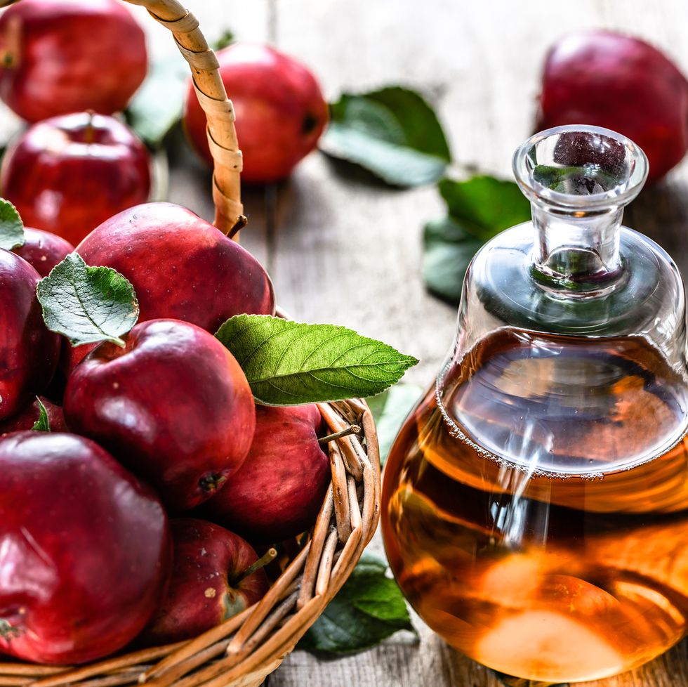 apple vinegar or cider, bottle of drink and apples, healthy organic food concept