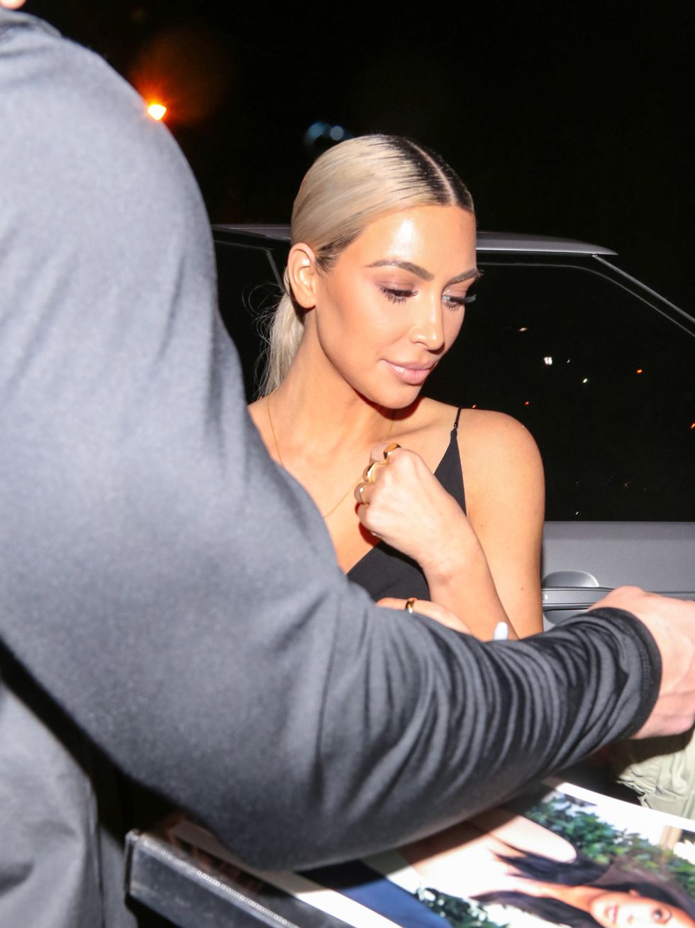 Kim Kardashian Is Rocking Some Serious Side Boob in This Skintight Sheer  Dress