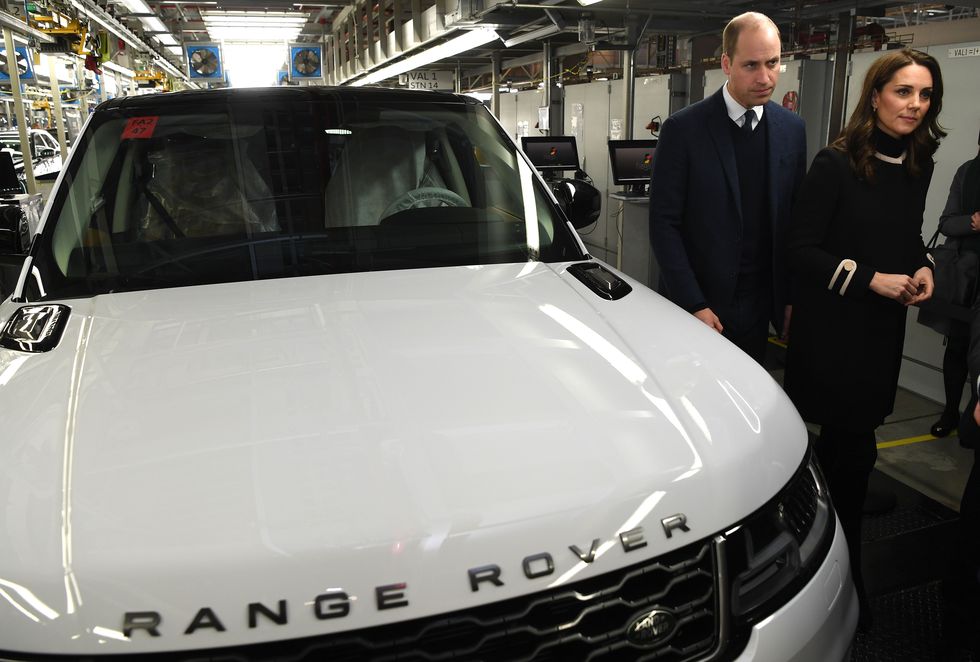 britains prince william, duke of cambridge, and britains catherine, duchess of cambridge, tour the range rover production line during their visit to jaguar land rovers solihull manufacturing plant in birmingham, central england on november 22, 2017   the duke and duchess of cambridge visited birmingham for a day of engagements on november 22 which saw them visit jaguar land rovers solihull site, aston villa football club and acme whistles, the creator of the first police whistle and the original acme thunderer photo by paul ellis  various sources  afp        photo credit should read paul ellisafp via getty images