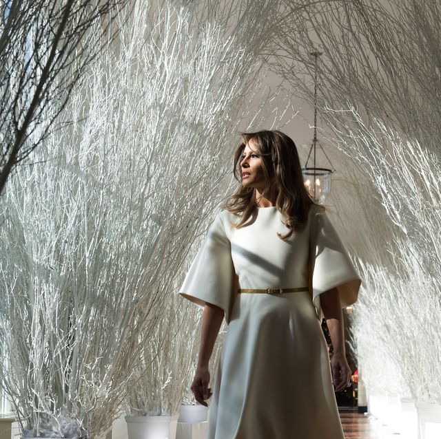 us first lady melania trump walks through christmas decorations in the east wing as she tours holiday decorations at the white house in washington, dc, on november 27, 2017 photo by saul loeb  afp photo by saul loebafp via getty images