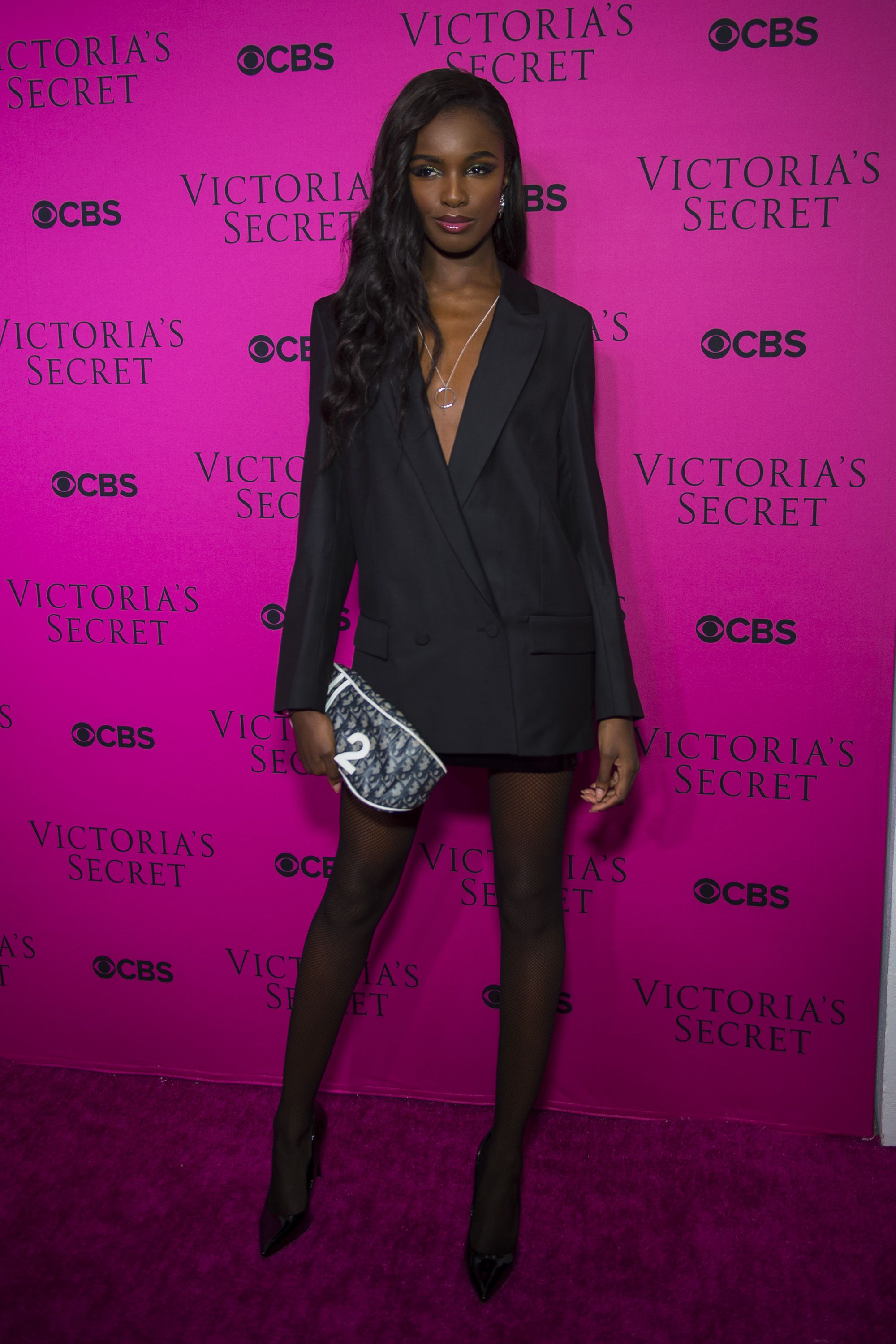 Leomie Anderson flaunts her jaw-dropping figure in a TINY leather bra at  H&M X Mugler launch event