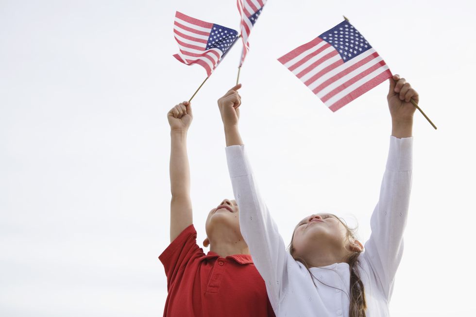 children waving american flags, malibu, california
