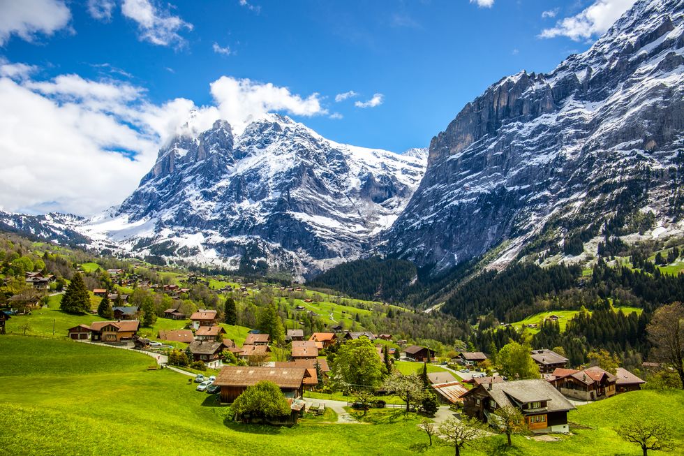 panoramic view of swiss village of grindelwald and mountain top of wetterhorn,bernese overland, switzerland