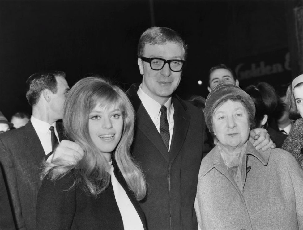 english actor michael caine brings his mother ellen right and girlfriend edina ronay left to the uk premiere of his film the ipcress file, 19th march 1965 photo by trevor humphriescentral presshulton archivegetty images