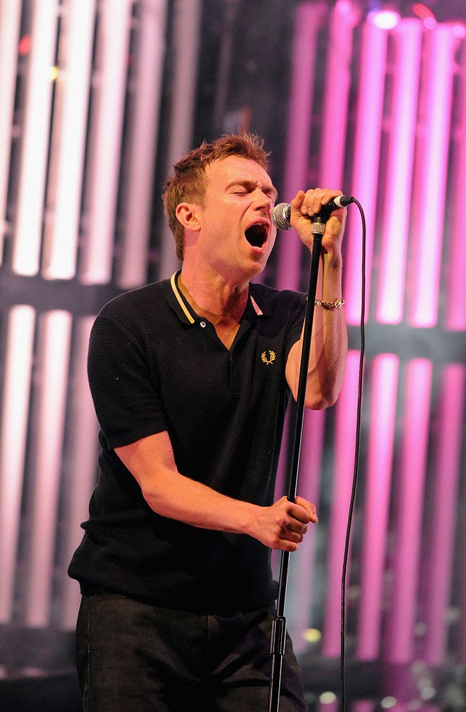 glastonbury, england june 28 damon albarn of blur performs on the pyramid stage during day 4 of the glastonbury festival at worthy farm in pilton, somerset on june 28, 2009 near glastonbury, england photo by jim dysongetty images