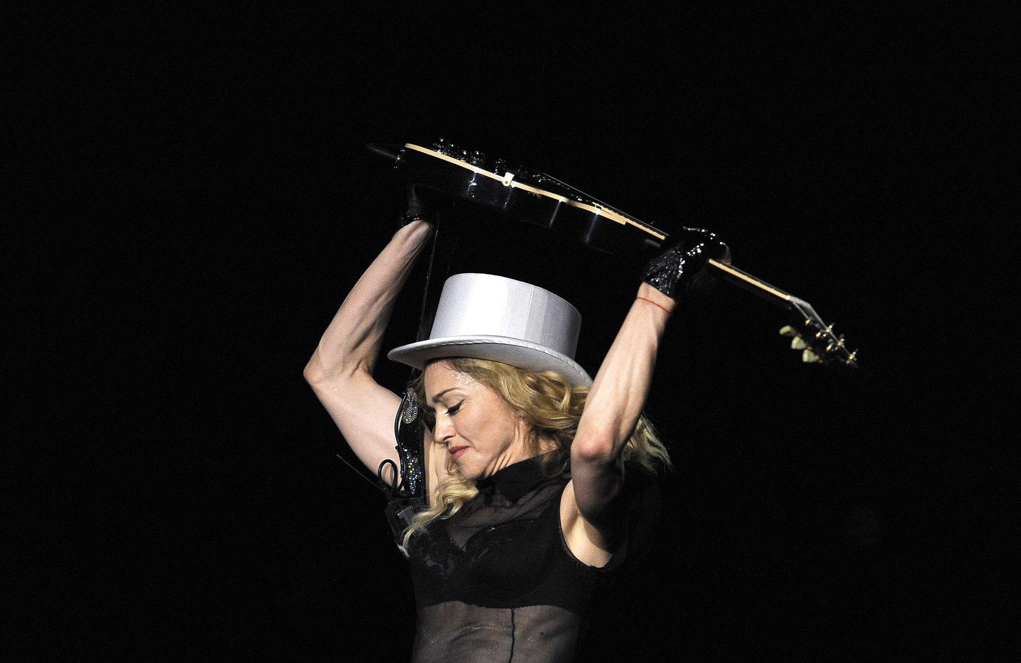 Photography, Headgear, Hand, Performance, Flash photography, Musical instrument, Hat, 