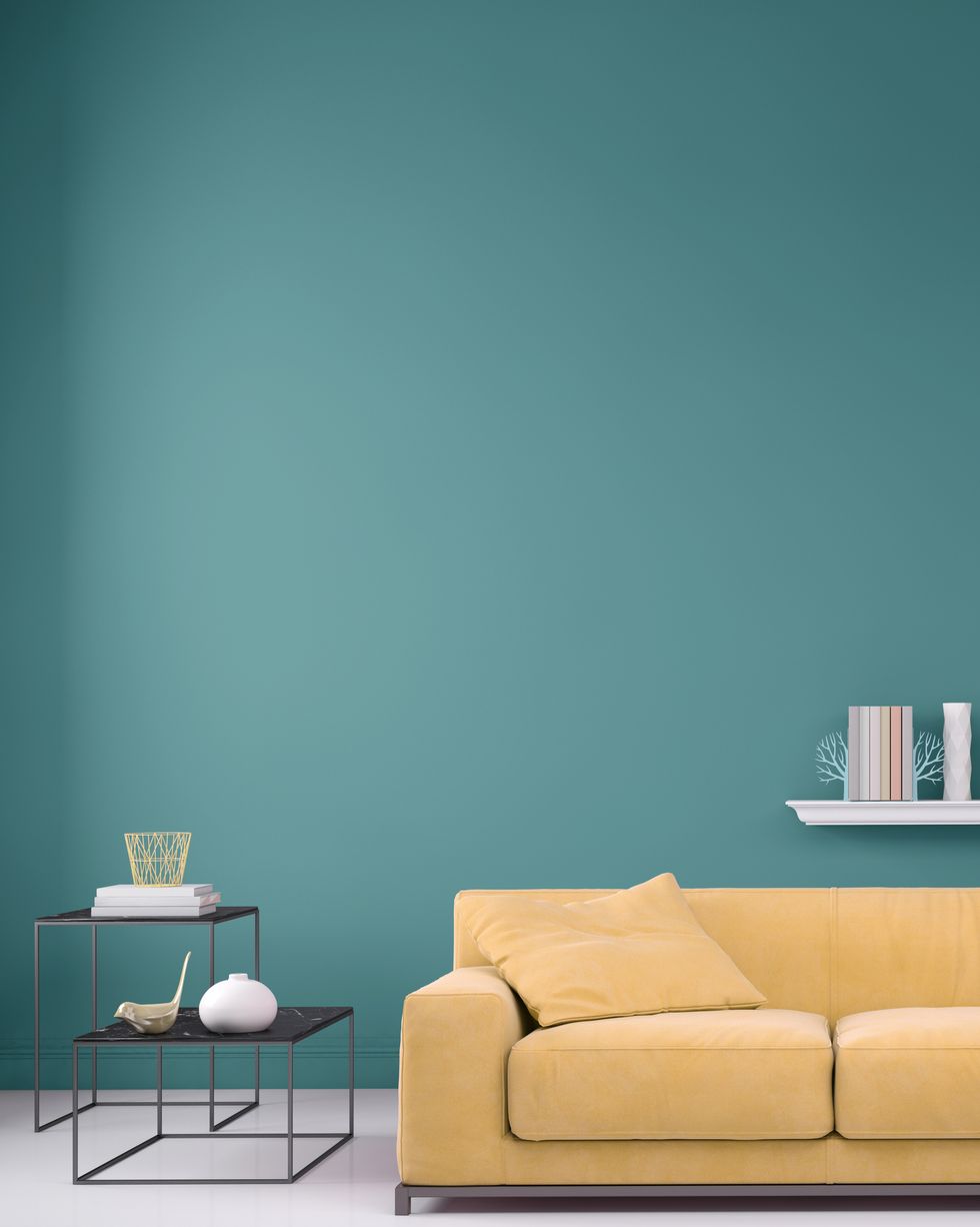 salón con paredes en verde turquesa