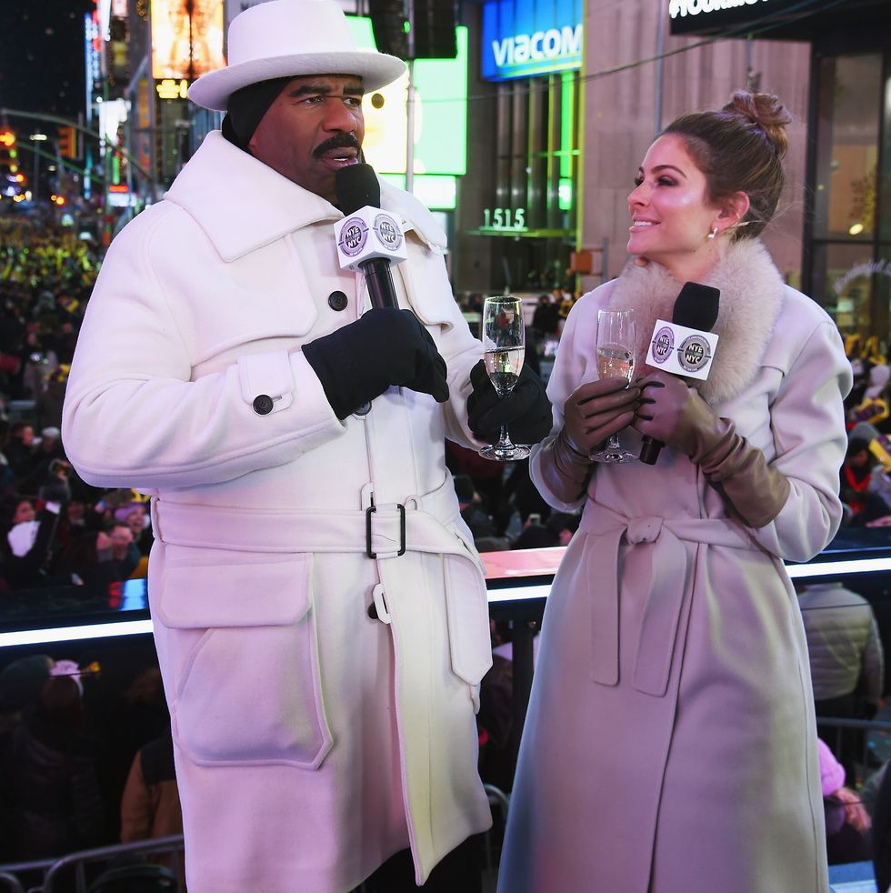 new york, ny   december 31  steve harvey l and maria menounos pose after her wedding ceremony during maria menounos and steve harvey live from times square at marriott marquis times square on december 31, 2017 in new york city  photo by dimitrios kambourisgetty images for mm