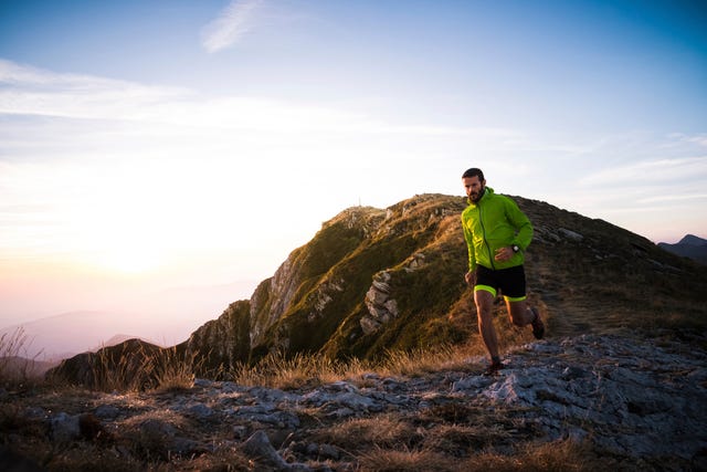 a man running on a mountain