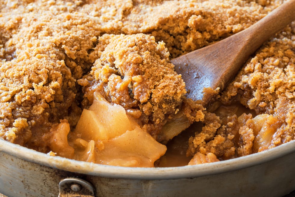 Detail of Spoonful of Apple Crisp or Apple Crumble Baked Dessert