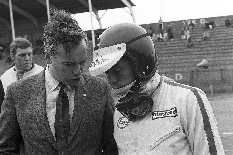 jim clark, lotus ford 49, grand prix of the netherlands, circuit park zandvoort, 04 june 1967 keith duckworth, father of the ford cosworth formula one engine, talking to jim clark during the 1967 dutch grand prix, which was teh first outing of the lotus ford cosworth, and which jim clark won photo by bernard cahiergetty images