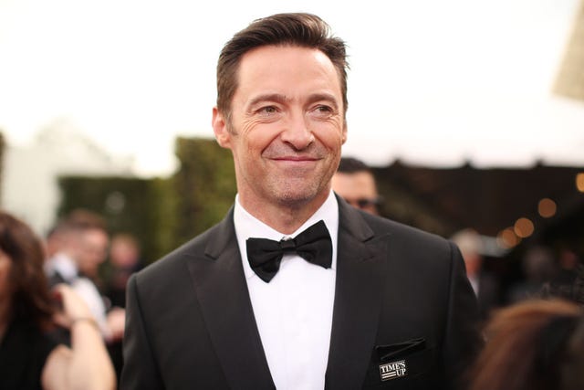 Hugh Jackman Has a Very Good Reason for Covering Up at the Beach